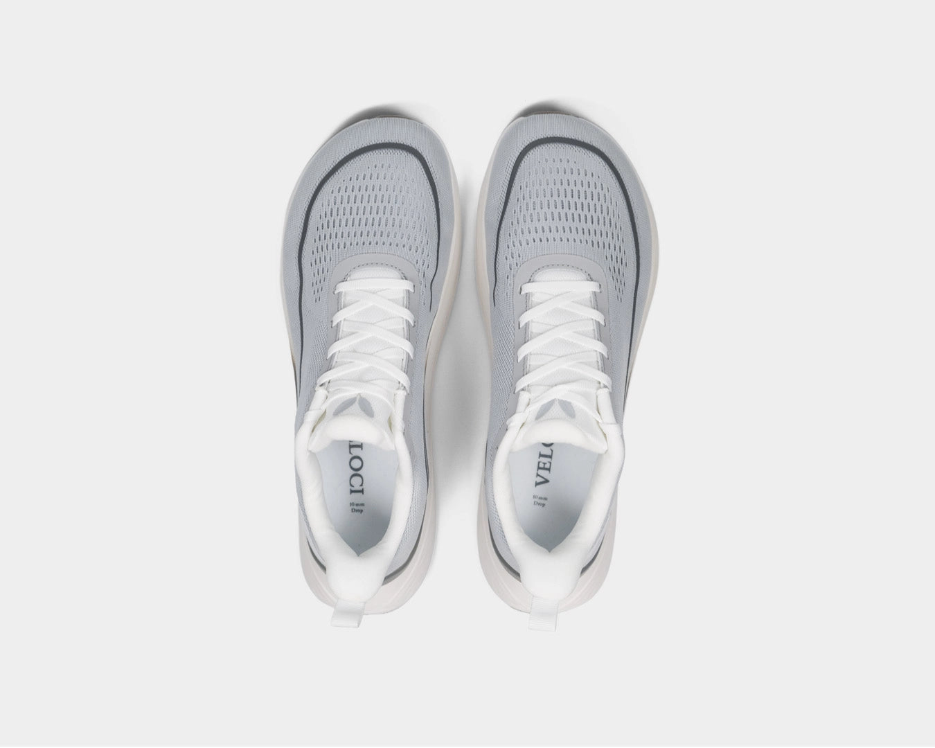 Top-down view of the Veloci Mesa pair in gray displaying the spacious toe box and stability features